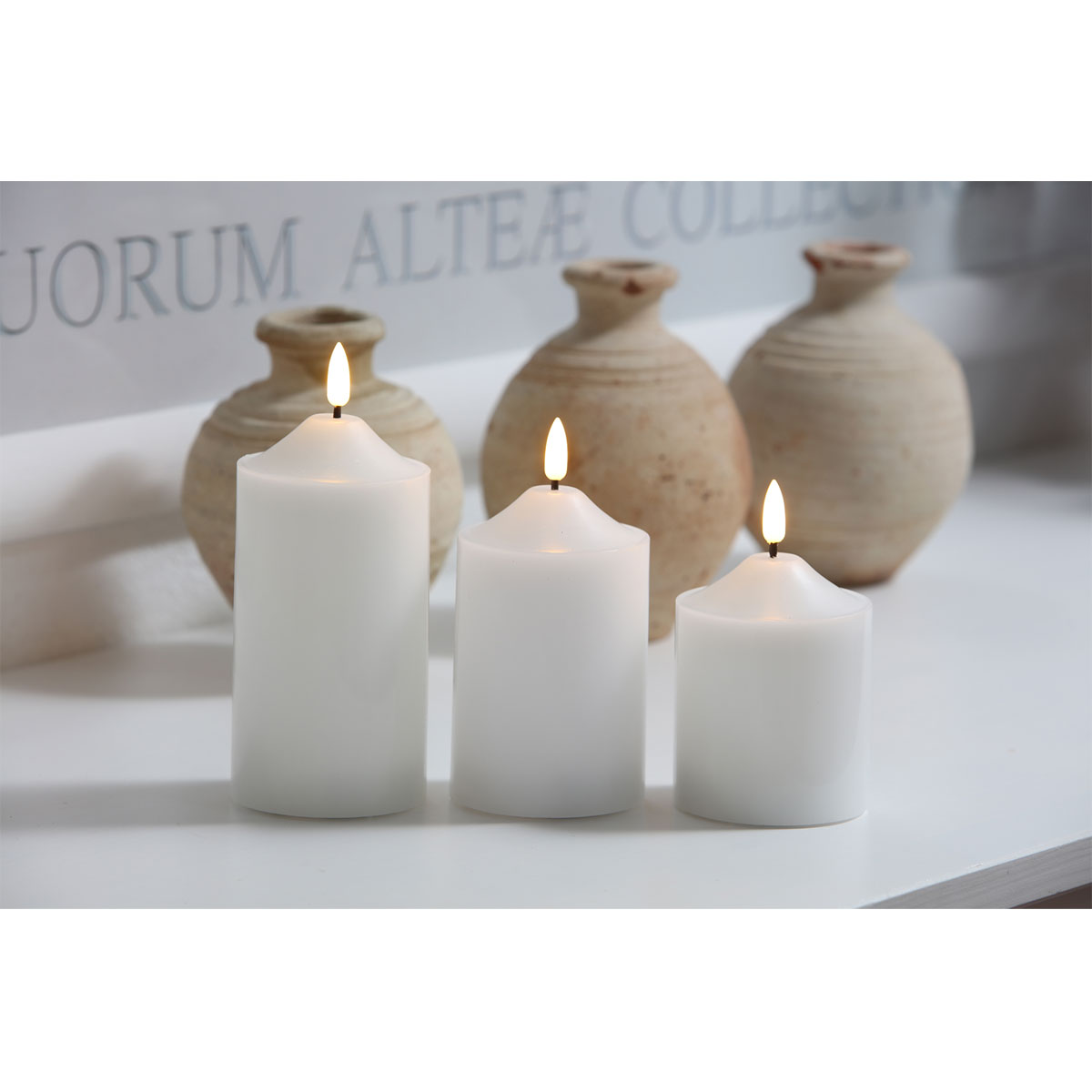 LED-Kerze Vela 7,5 x 12 cm weiß Bild 2