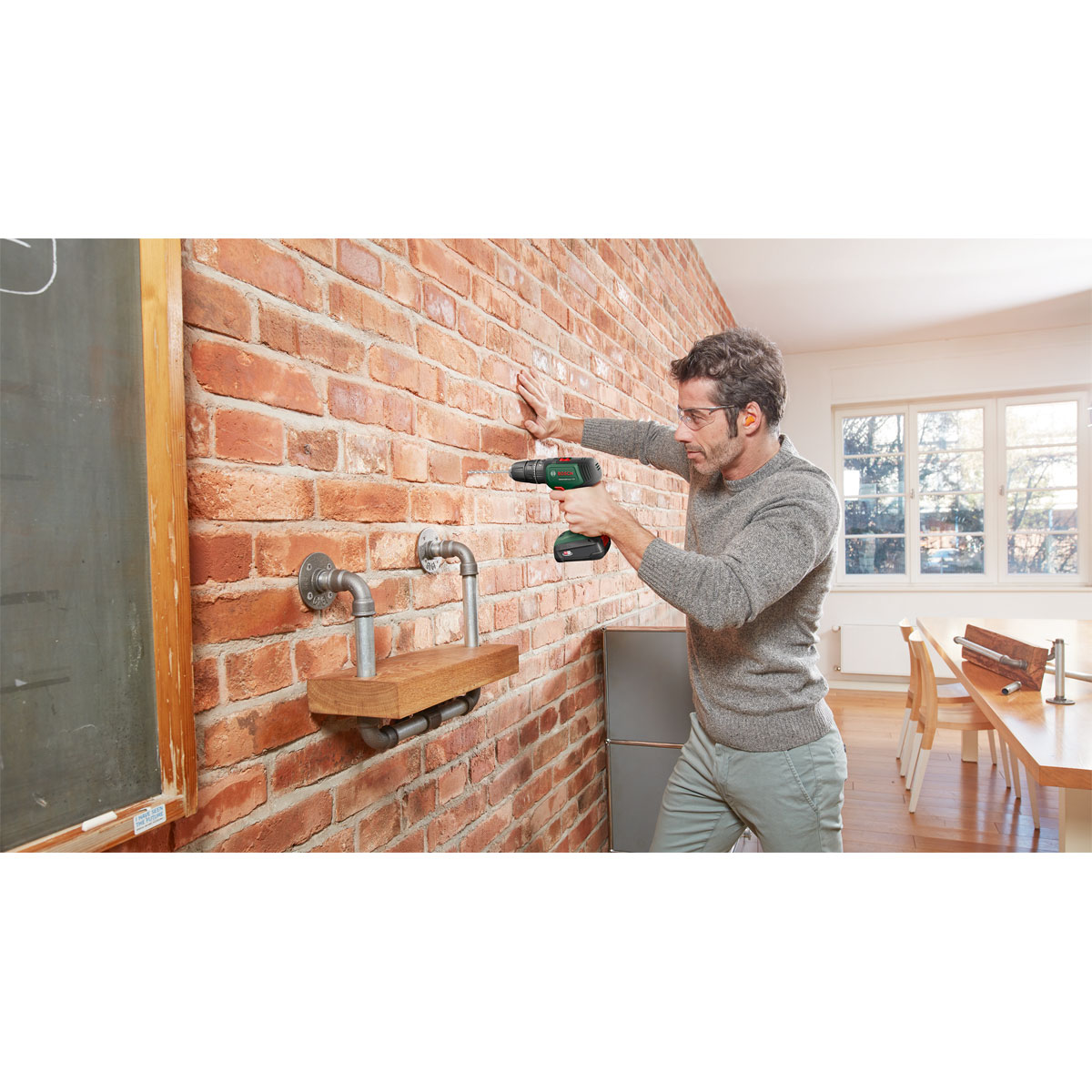 Bosch  Akku-Schlagbohrschrauber UniversalImpact 18V 2 Akkus Ladegerät und Zubehör Bild 4