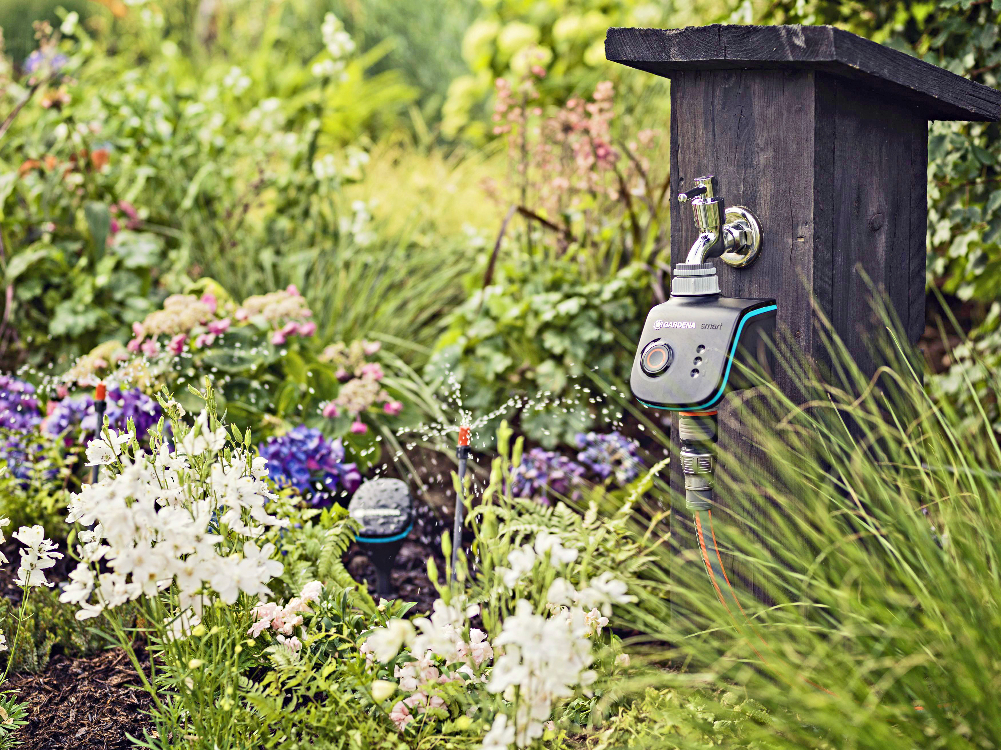 Gartenbewässerungssystem an einem Wasserhahn